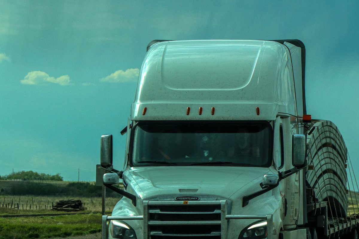 Freightliner tractor-trailer traveling on a Texas highway